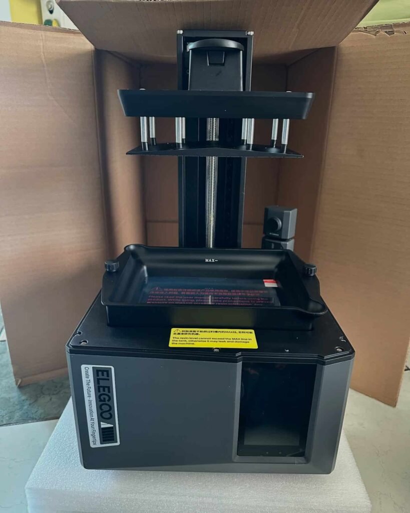 view of our own purchase testing elegoo mars 4 ultra, mars 5 ultra 3d printer for miniatures uk unboxing package arrival several weeks to months