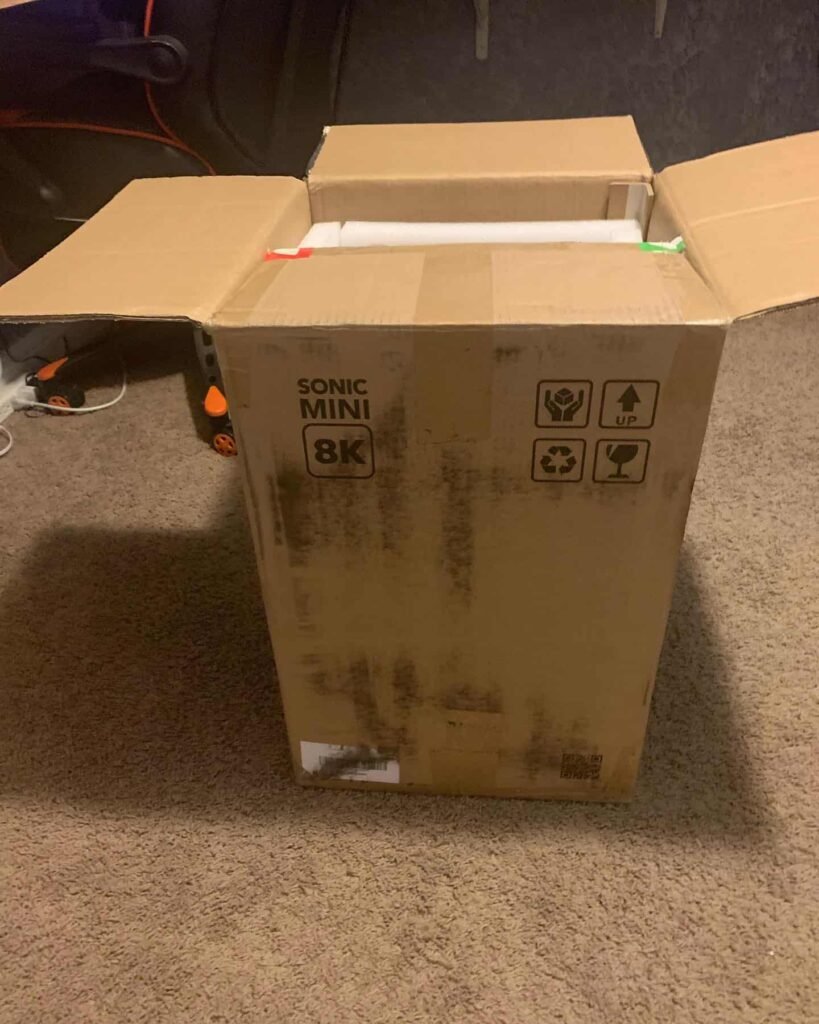 view of our own purchase testing phrozen sonic mini 8k 8ks 3d printer for miniatures uk unboxing package arrival several weeks to months