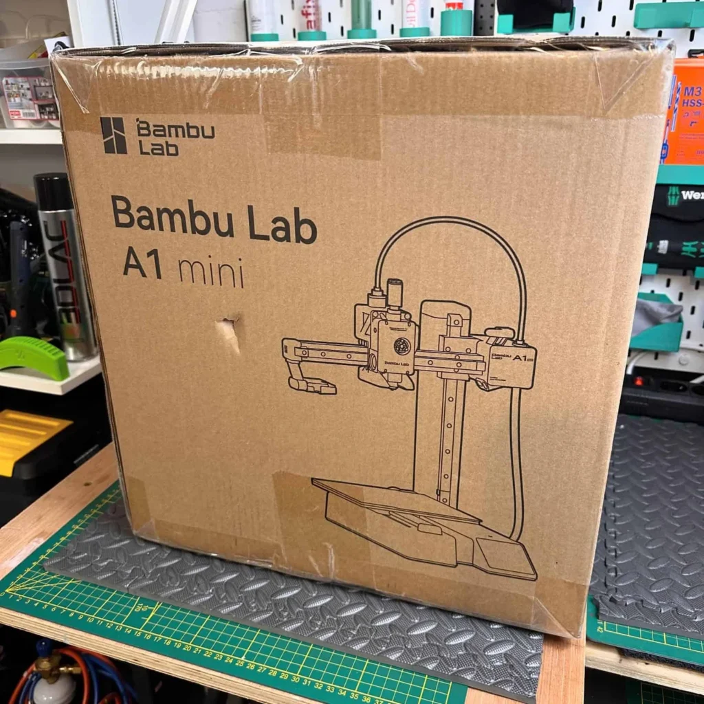 our own purchase of unboxed bambu lab a1 mini cheap 3d printer for beginners for tried and testing unboxing for several weeks to months.jpg
