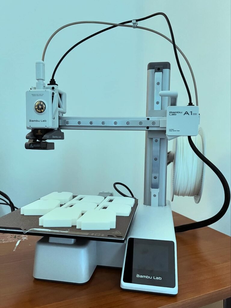 view of our own purchase testing bambu lab a1 mini 3d printer for home use uk unboxing package arrival several weeks to months